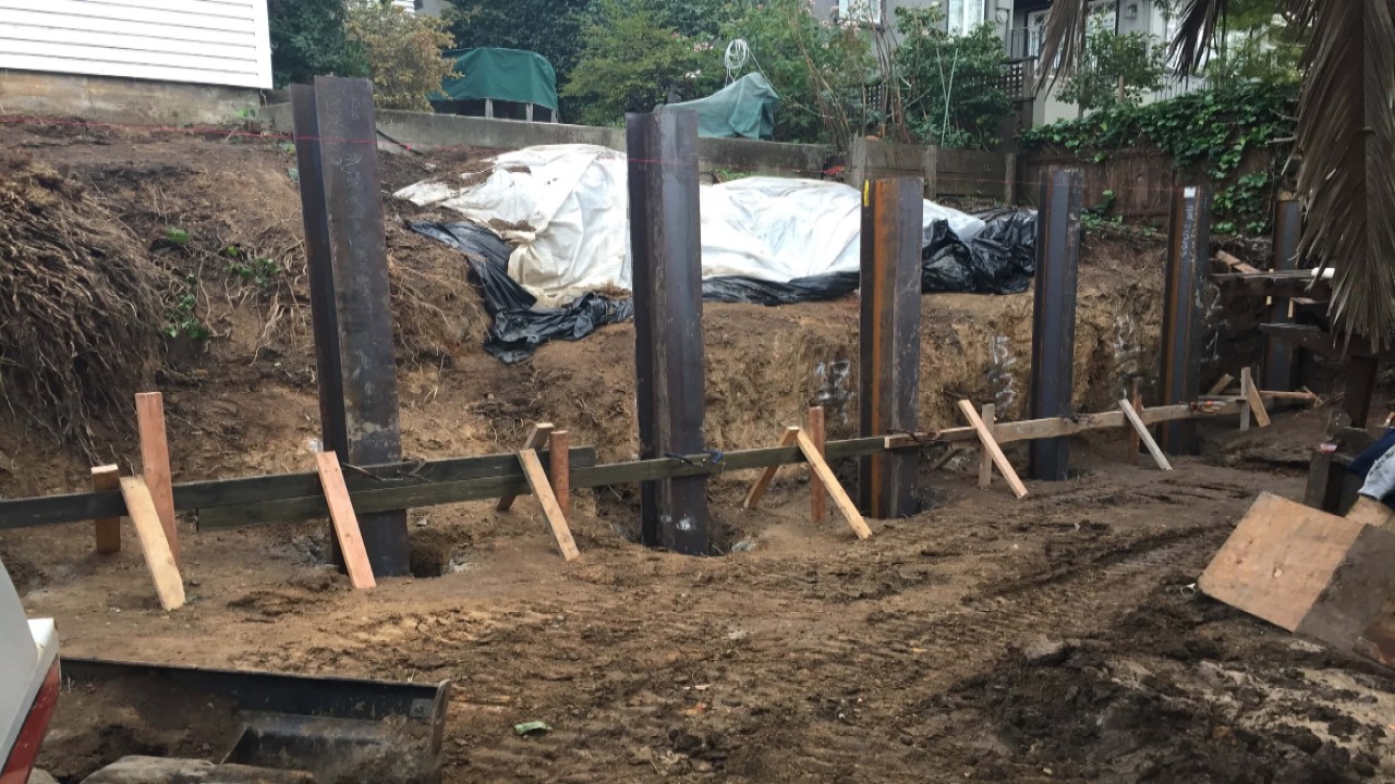 steel beam retaining wall construction